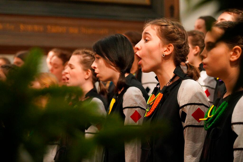 Members of the Shchedryk youth choir perform during a Christmas concert at Copenhagen’s Church of the Holy Spirit