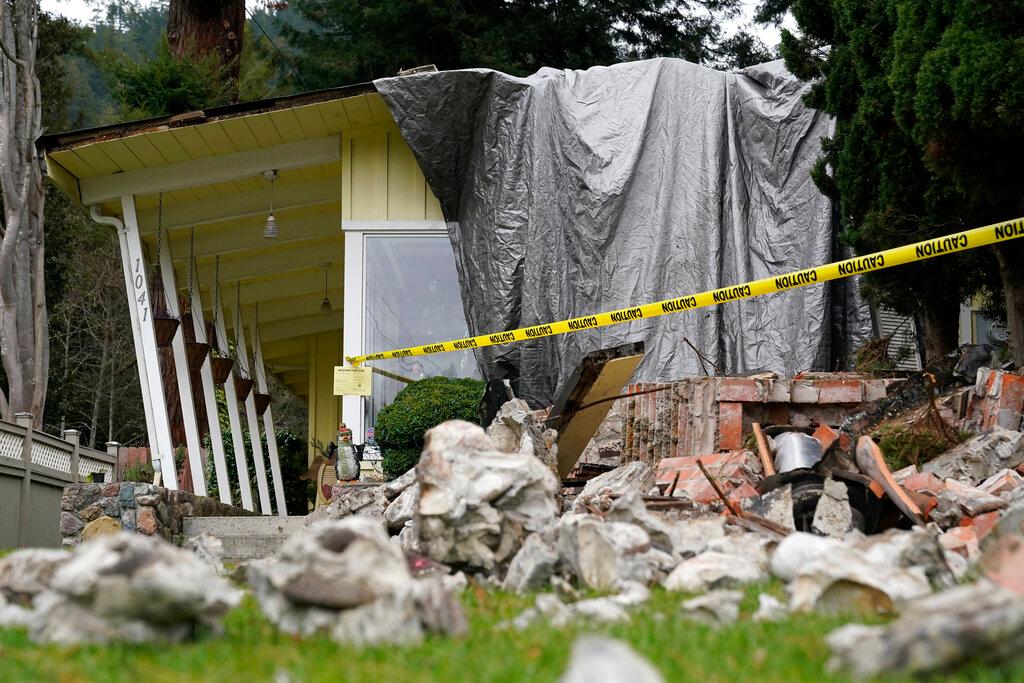 A home damaged by an earthquake can be seen in Rio Dell, Calif.
