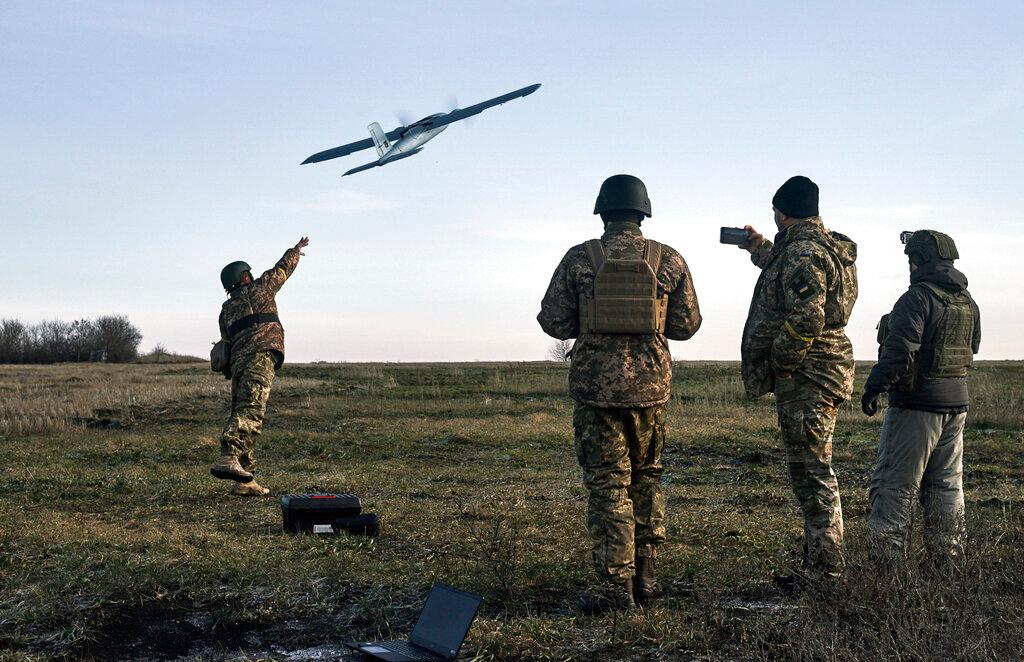 Ukrainian soldiers launch a drone at Russian positions near Bakhmut, Donetsk region, Ukraine