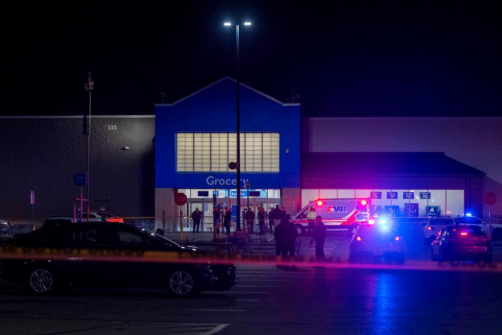 Emergency responders work the scene of a shooting at the West Side Walmart in Evansville, Ind.