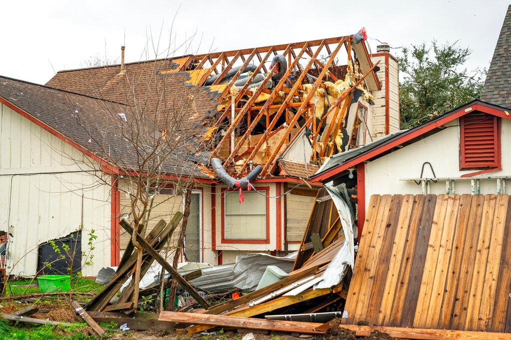 house damaged by tornado