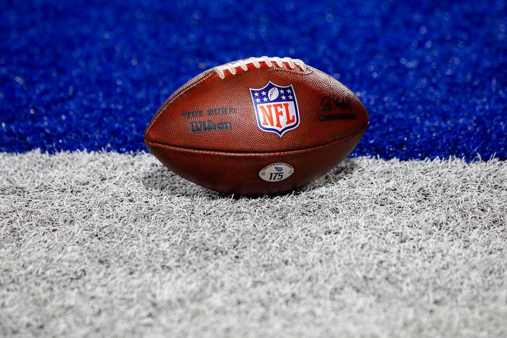 An NFL football lies in the endzone during an NFL football game