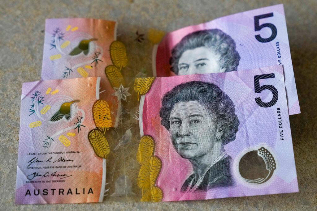 Australian $5 notes are pictured in Sydney on Sept. 10, 2022. King Charles III won’t feature on Australia's new $5 bill, the nation's central bank announced Thursday, Feb. 2, 2023, signaling a phasing out of the British monarchy from Australian bank notes, although he is still expected to feature on coins.