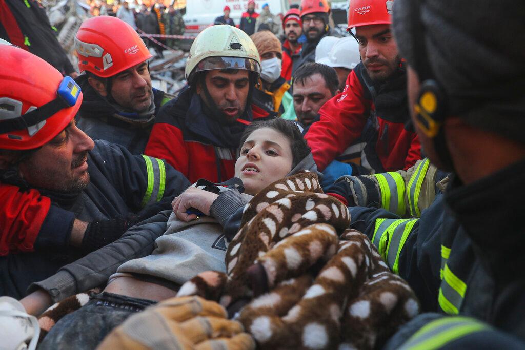 12 year old survivor pulled from rubble