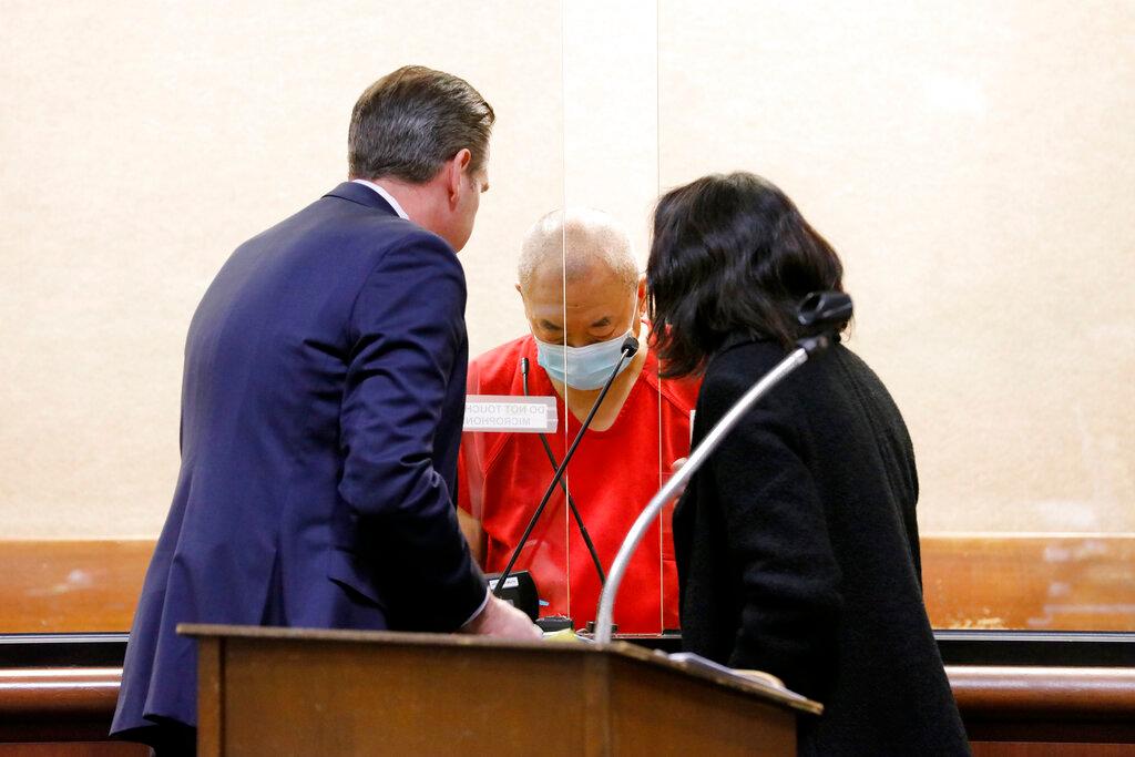 Chunli Zhao, center, appears for a plea hearing with his defense attorney Eric Hove, left, at San Mateo Superior Court in Redwood City, Calif.