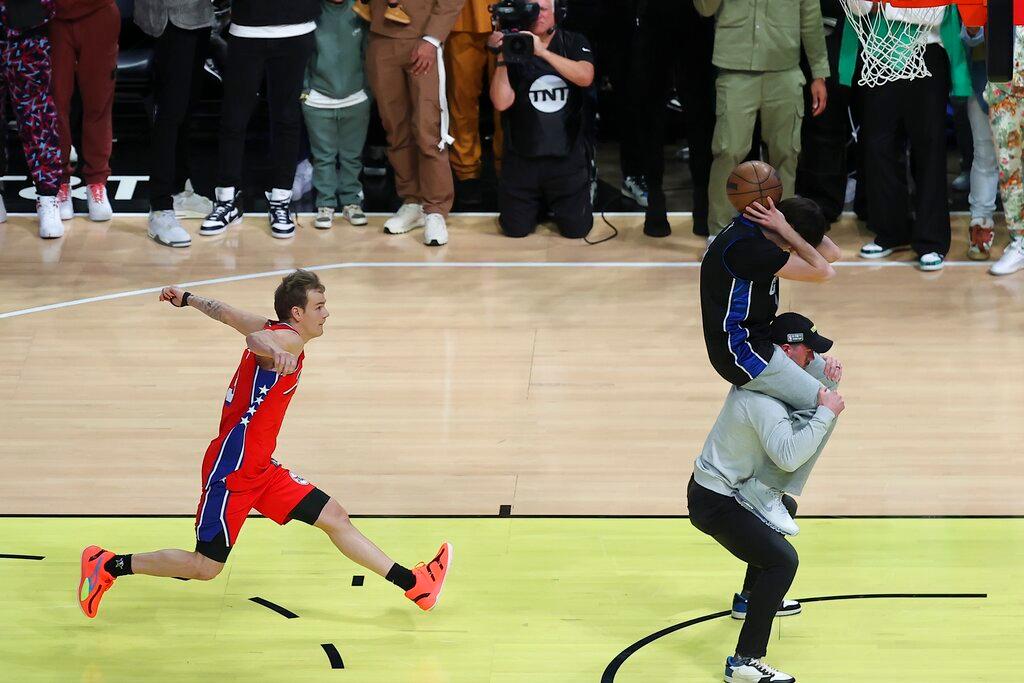 Mac McClung of the Philadelphia 76ers shoots during All-Star slam dunk competition