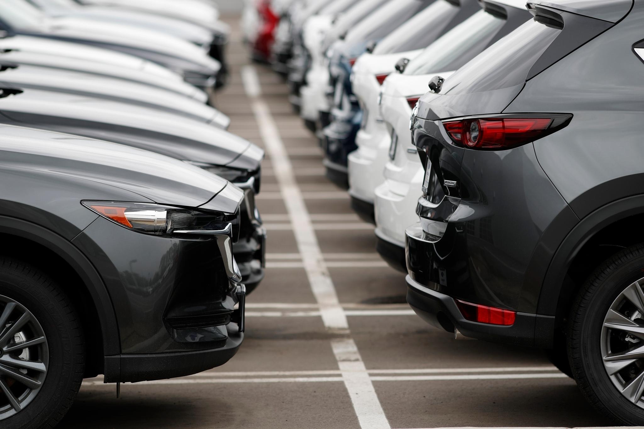  Unsold vehicles sit at a dealership in Littleton, Colo