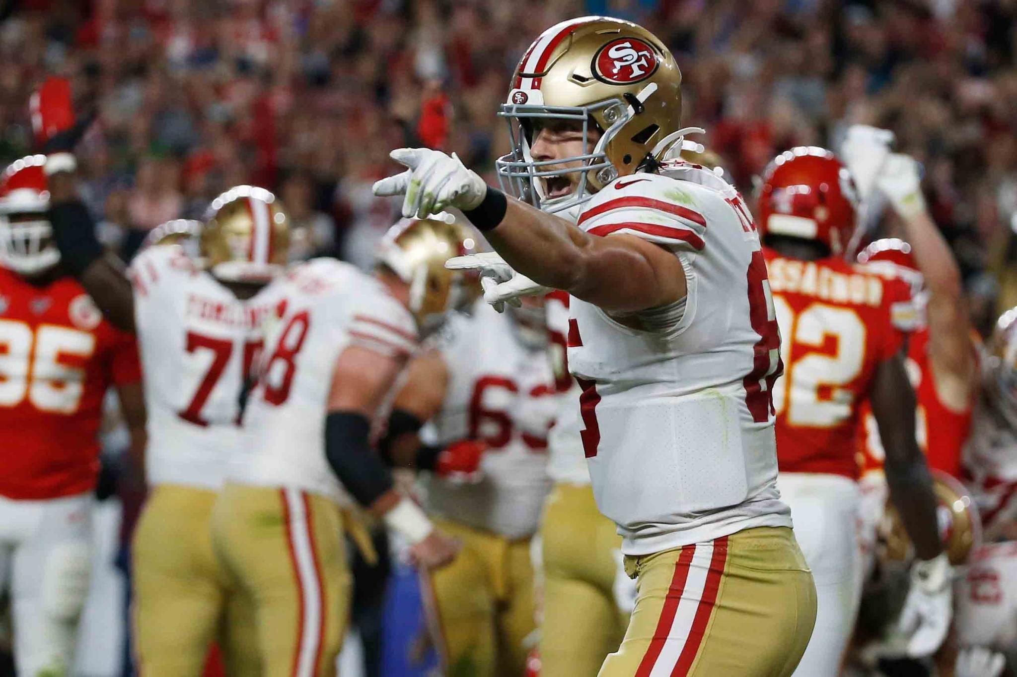 San Francisco 49ers' George Kittle celebrates after Raheem Mostert scored against the Kansas City Chiefs during the second half of the NFL Super Bowl 54 football game
