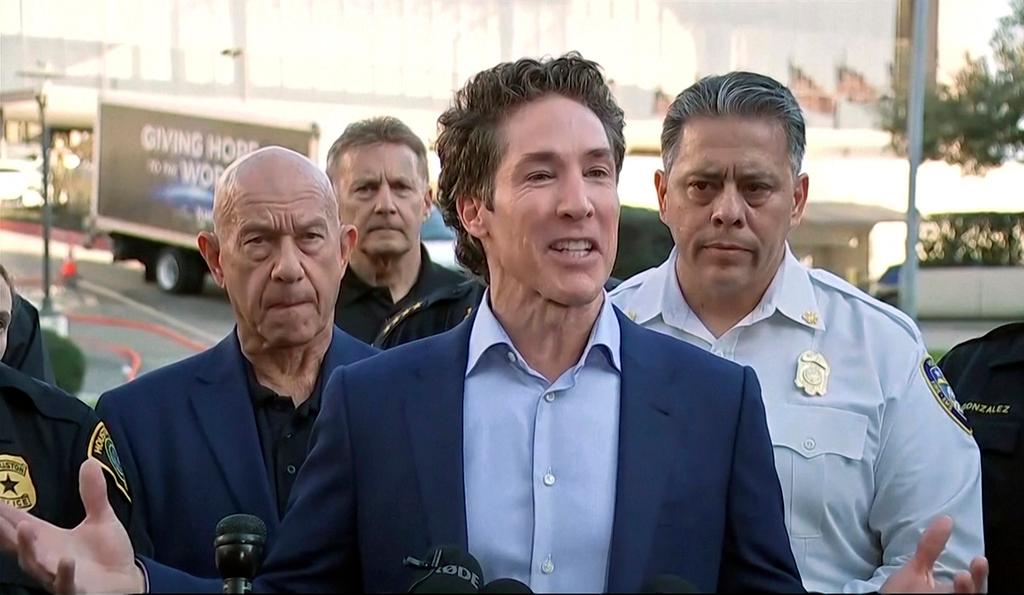 Pastor Joel Osteen speaks to the media after a shooting at Lakewood Church in Houston