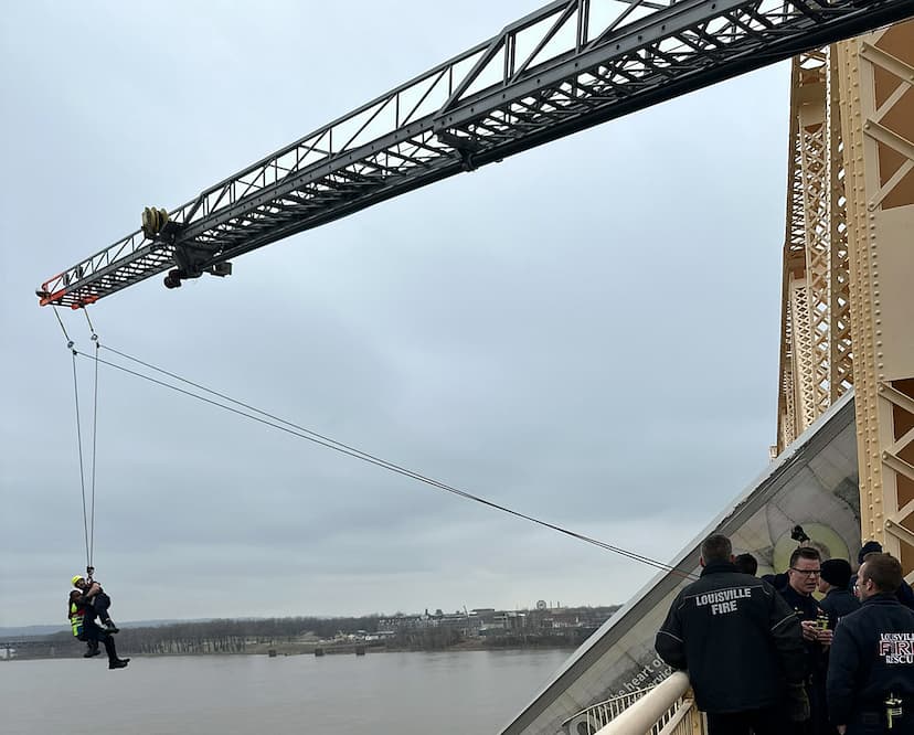 Driver in truck dangling over Ohio river safely rescued by fire department