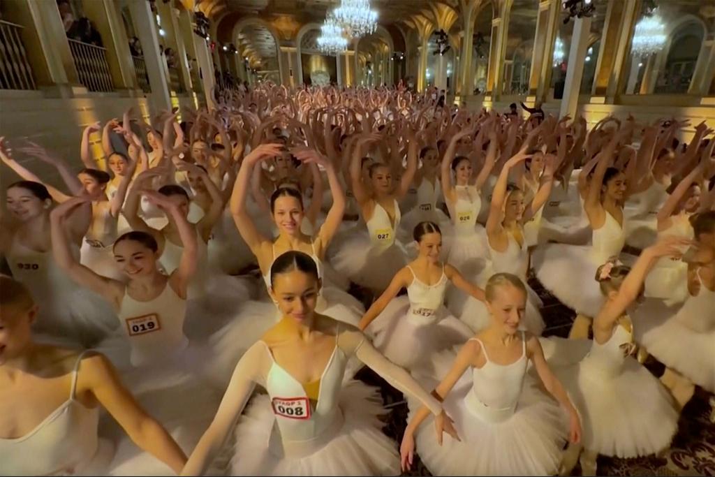 Hundreds of young dancers performing in the Plaza Hotel in New York, to break the world record for dancing on pointe in one place