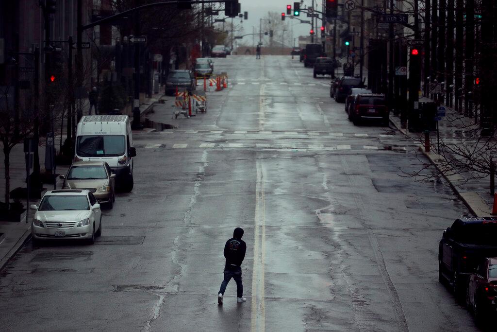 Man Walking Across Street In Kansas City 