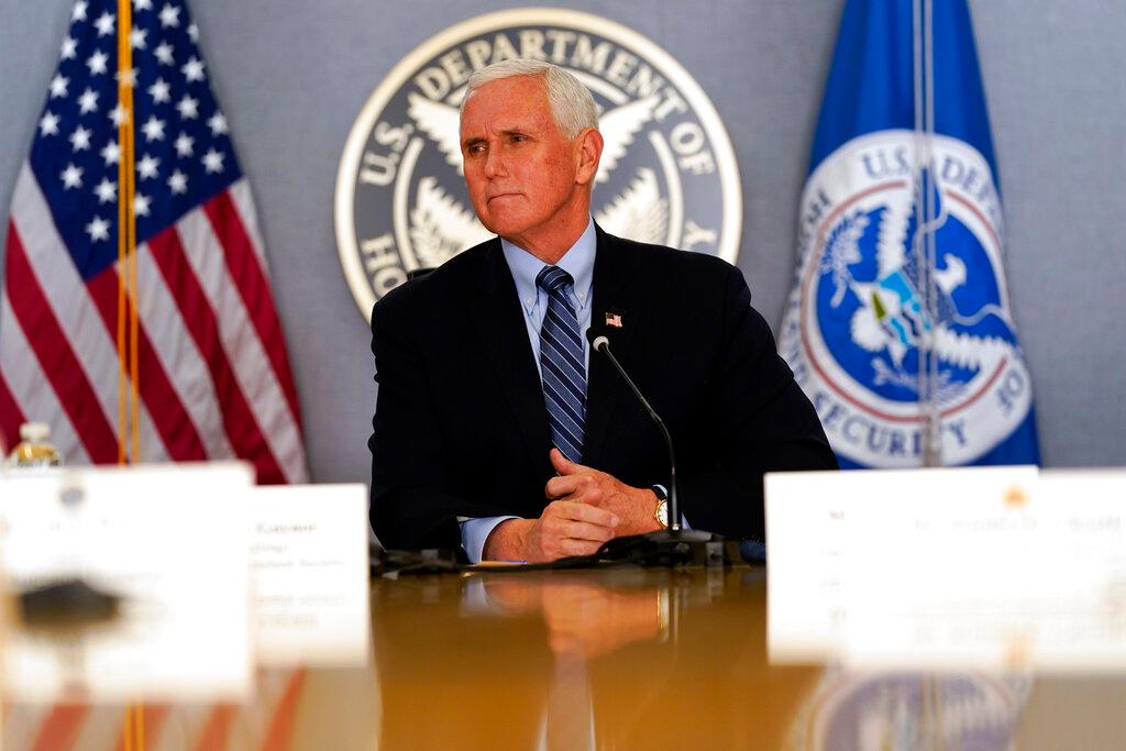 Vice President Mike Pence listens during a briefing about the upcoming presidential inauguration of President-elect Joe Biden and Vice President-elect Kamala Harris, at FEMA headquarters