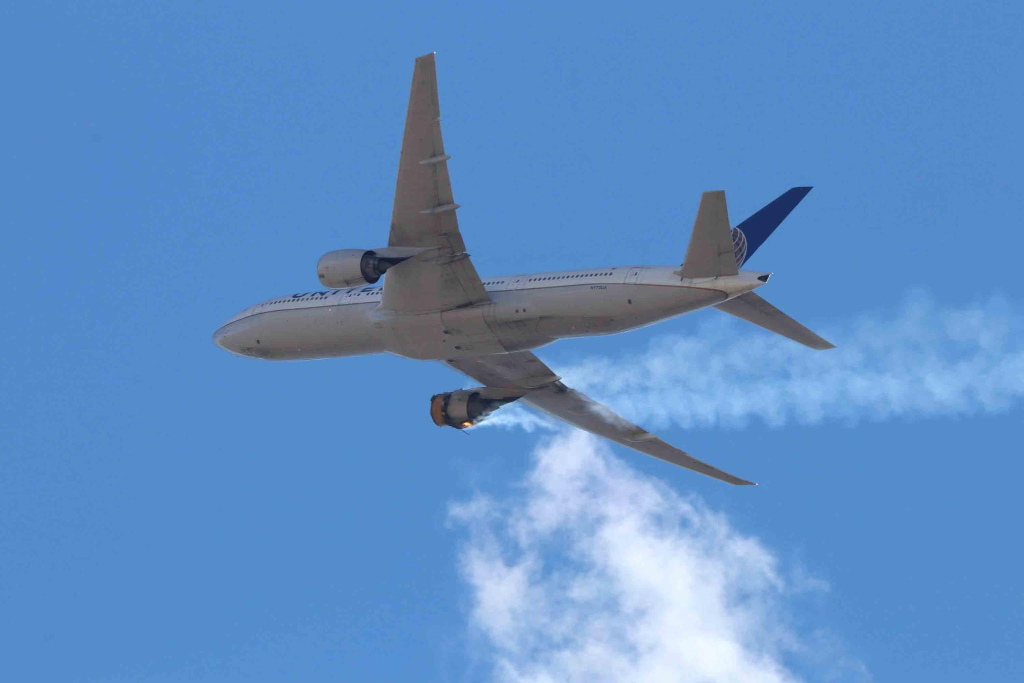 This Saturday, Feb. 20, 2021 photo provided by Hayden Smith shows United Airlines Flight 328 approaching Denver International Airport, after experiencing "a right-engine failure" shortly after takeoff from Denver.