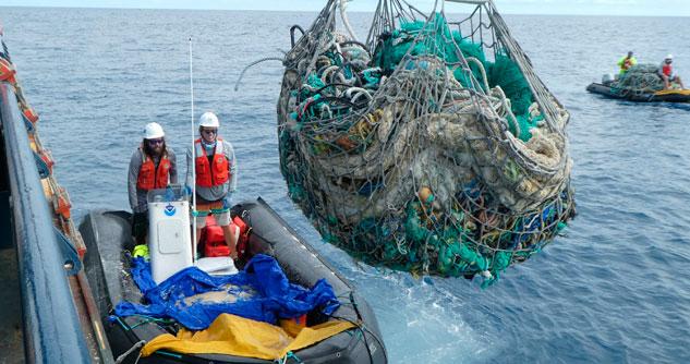 A crew with a boatload of marine plastic and abandoned fishing nets