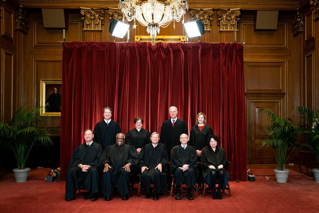 Supreme Court Justices: Seated from left are Associate Justice Samuel Alito, Associate Justice Clarence Thomas, Chief Justice John Roberts, Associate Justice Stephen Breyer and Associate Justice Sonia Sotomayor, Standing from left are Associate Justice Brett Kavanaugh, Associate Justice Elena Kagan, Associate Justice Neil Gorsuch and Associate Justice Amy Coney Barrett