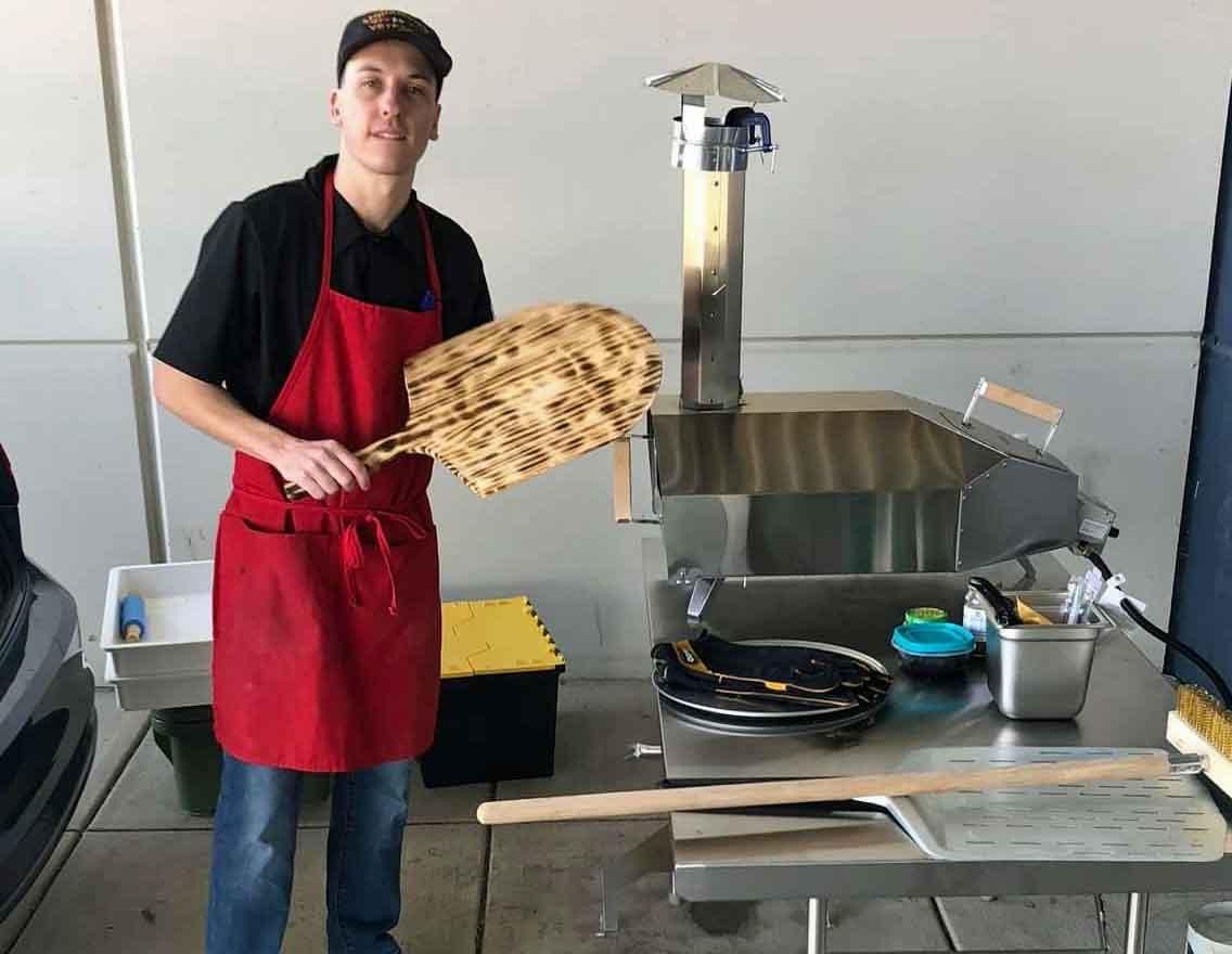 Brian with portable pizza oven