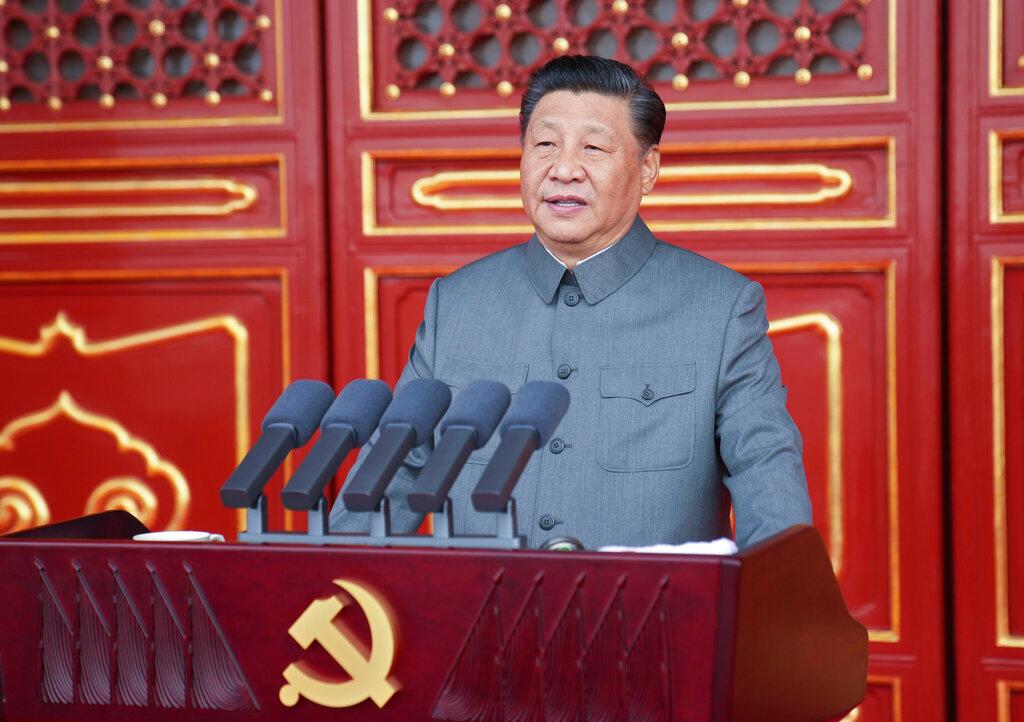 Chinese President and party leader Xi Jinping wears Mao-like suit