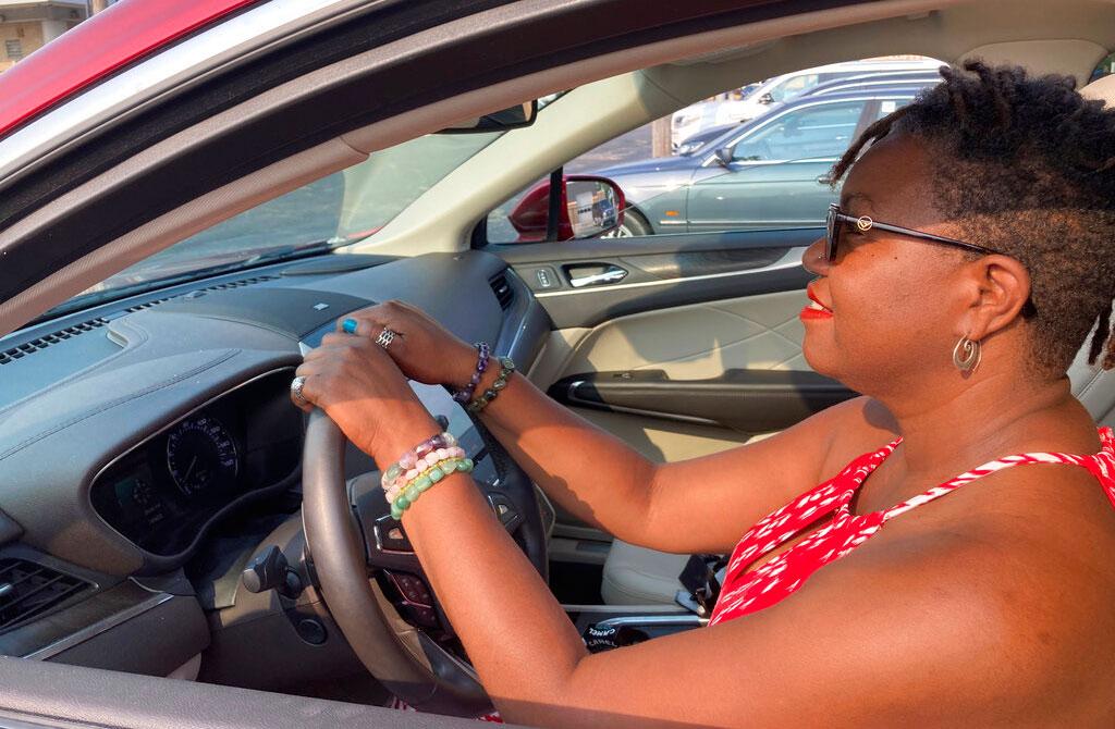 Woman test driving car 