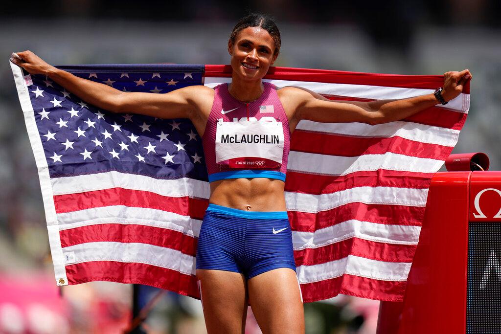 Sydney McLaughlin, of United States celebrates after winning the gold medal in the final of the the women's 400-meter hurdles at the 2020 Summer Olympics