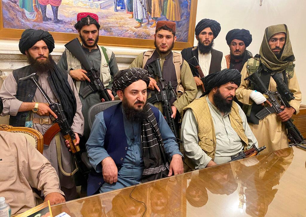 Taliban fighters take control of Afghan presidential palace 