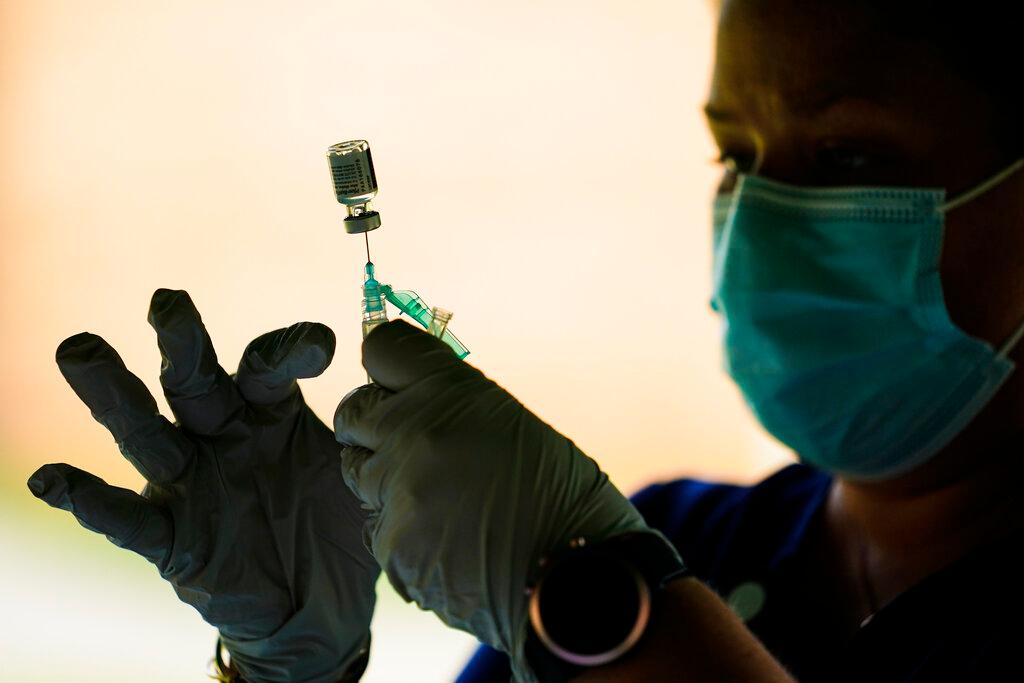 Syringe is prepared with Pfizer COVID-19 vaccine