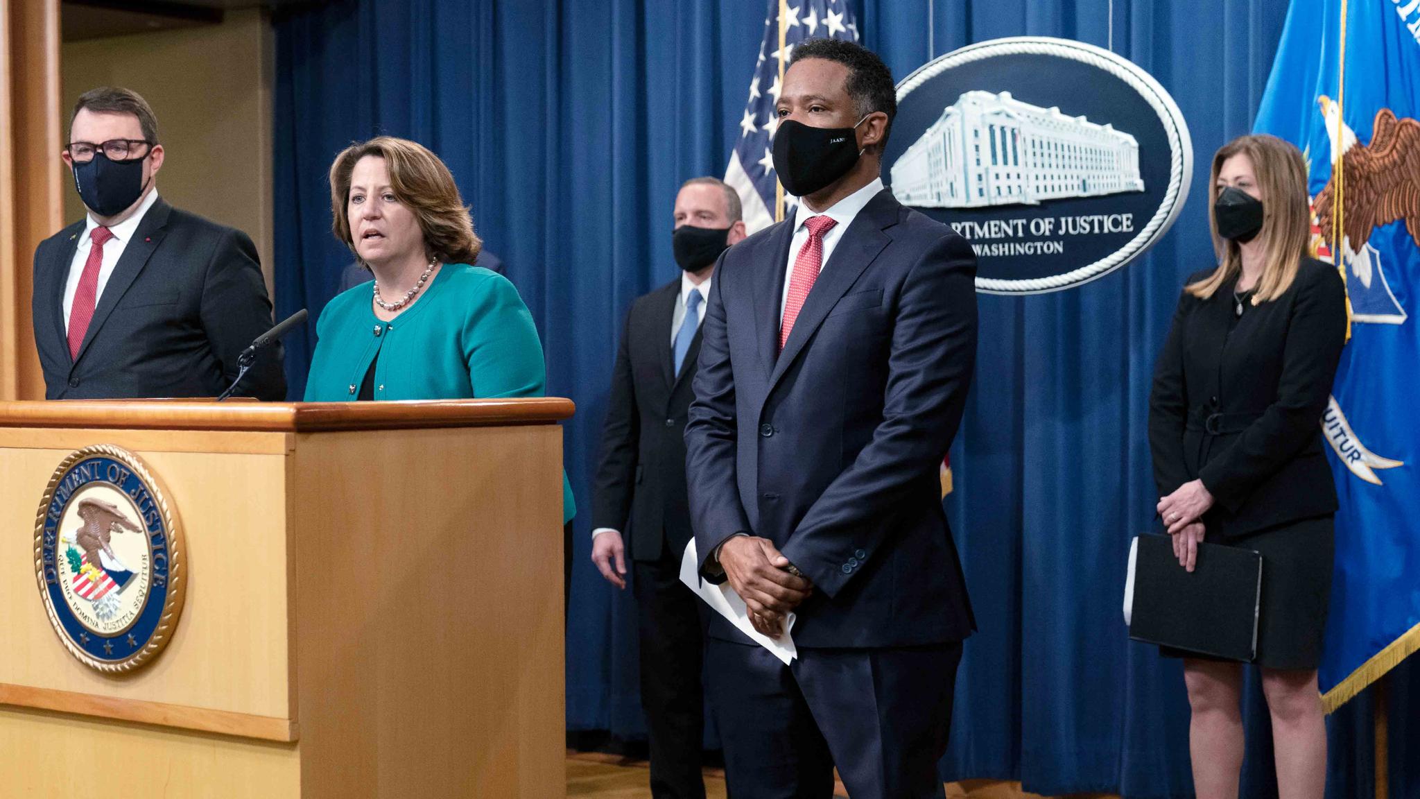 Deputy Attorney General Lisa Monaco, second from left, together with, from left, Deputy Executive Director Jean-Philippe Lecouffe of Europol; FBI Deputy Director Paul Abbate; Assistant Attorney General Kenneth Polite Jr. of the Justice Department's Criminal Division; and Drug Enforcement Administration Administrator Anne Milgram, speaks during a news at the Department of Justice in Washington, Tuesday, Oct. 26, 2021.