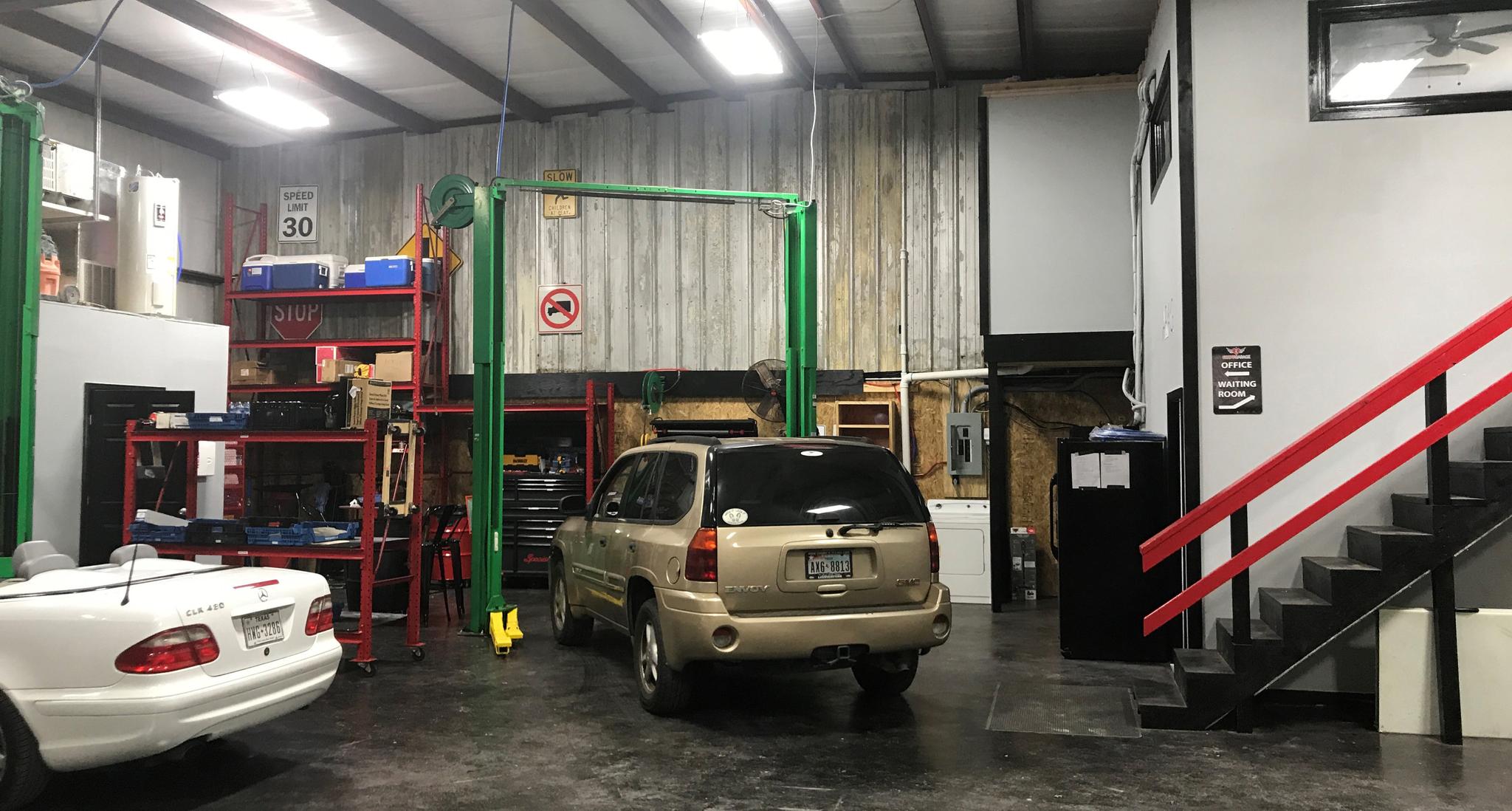 God's Garage repair shop with cars