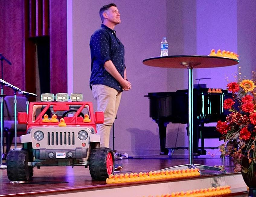 Pastor David Evans takes a cue from Jeep owners
