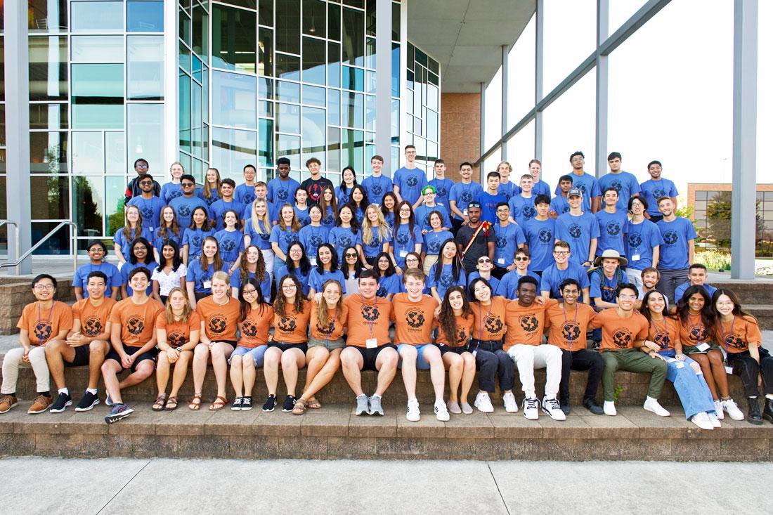 Upperclassmen international students (orange) meet new freshmen from around the world (blue)