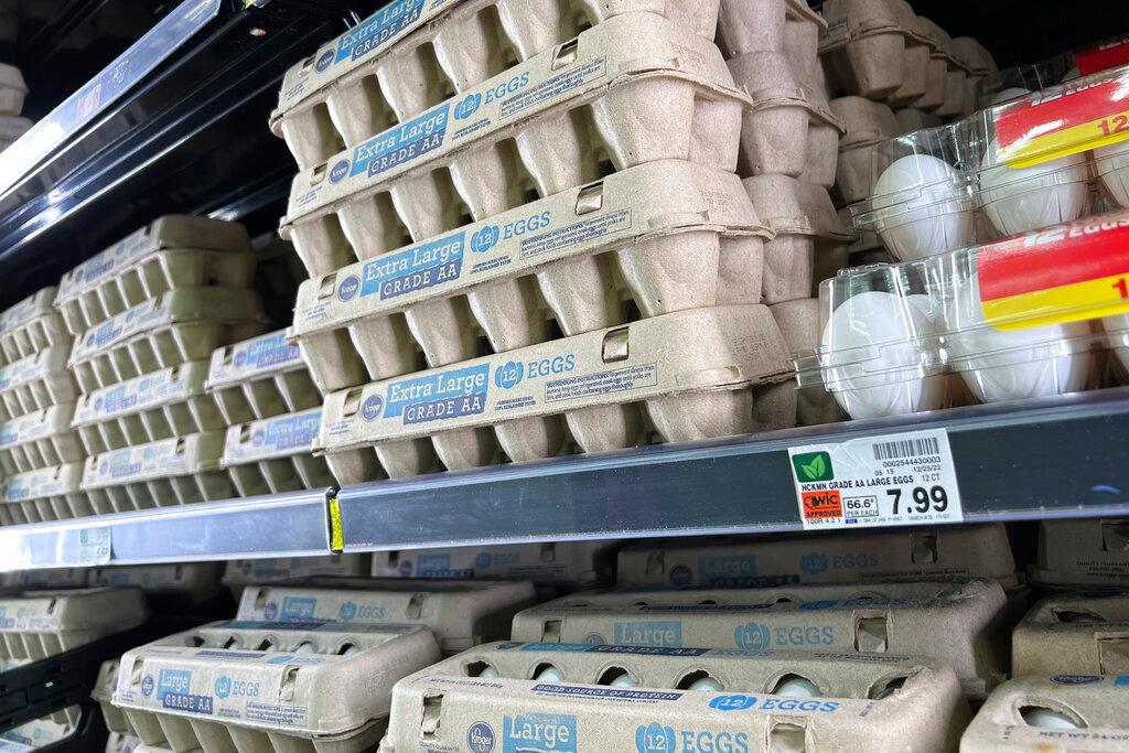 Eggs are displayed on store shelves at a local grocery store in Chandler, Ariz.