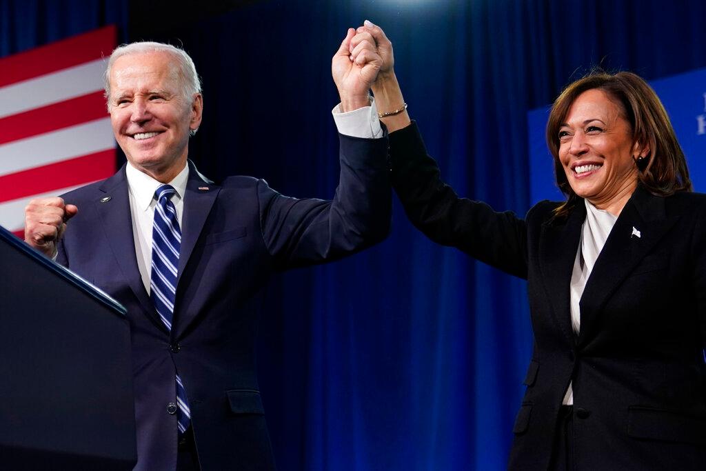 President Joe Biden and Vice President Kamala Harris stand on stage at the Democratic National Committee winter meeting, Feb. 3, 2023, in Philadelphia. A majority of Democrats now think one term is plenty for Biden, despite his insistence that he plans to seek reelection in 2024. That's according to a new poll from The Associated Press-NORC Center for Public Affairs Research.